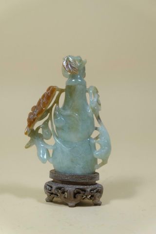 A Craved Jade Jadeite Vase With Wood Stand.