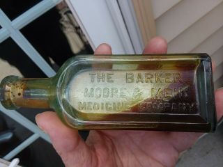 BARKER ' S NERVE & BONELINIMENT LABELED,  EMBOSSED AQUA BLOWN CORK TRACE CONTENTS 8