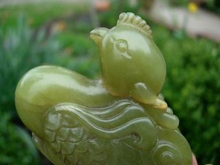 A GOOD ANTIQUE CHINESE CELADON GREEN JADE FIGURE OF PHOENIX 12