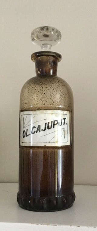 Antique Ol.  Cajuput Apothecary Pharmacy Jar W/ Stopper Milkglass Label