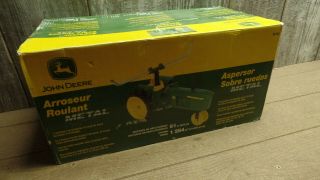 John Deere Traveling Sprinkler Tractor -