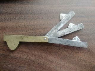 Antique Joseph Rogers and Sons metal fleam bloodletting tool 3 spikes 2