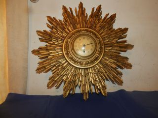 Vintage French Giltwood Sunburst Wall Mounting Mechanical Wall Clock.