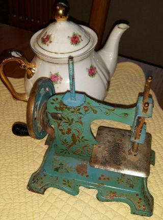 Metal child toy sewing machine Germany? blue piece 4