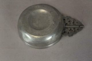 18TH C PEWTER PORRINGER WITH A FULLY DEVELOPED CUT AND DECORATED HANDLE 11