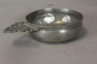 18TH C PEWTER PORRINGER WITH A FULLY DEVELOPED CUT AND DECORATED HANDLE 5