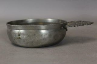 18TH C PEWTER PORRINGER WITH A FULLY DEVELOPED CUT AND DECORATED HANDLE 6