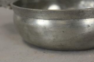 18TH C PEWTER PORRINGER WITH A FULLY DEVELOPED CUT AND DECORATED HANDLE 7