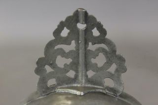 18TH C PEWTER PORRINGER WITH A FULLY DEVELOPED CUT AND DECORATED HANDLE 9