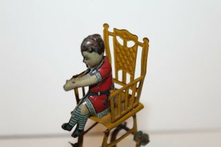 EARLY 1900 ' s GERMAN TIN LITHO CHILD IN HIGH CHAIR PENNY TOY 3