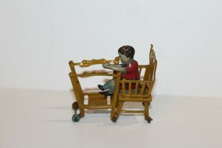 EARLY 1900 ' s GERMAN TIN LITHO CHILD IN HIGH CHAIR PENNY TOY 9