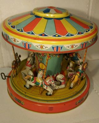 1950s J.  Chein Tin Litho Playland Merry Go Round Wind Up Toy