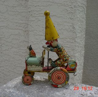 Vintage Unique Art Mfg Artie The Clown Car Tin Wind Up Toy