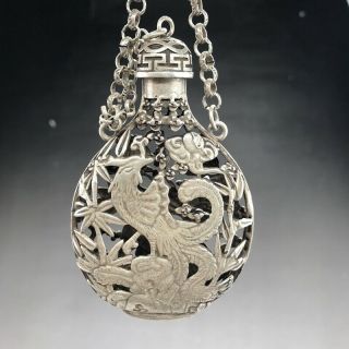 A Phoenix Image Of A Silver Snuff Bottle Carved By Hand In Ancient Tibet