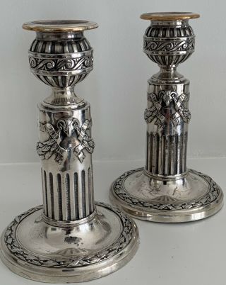 A Silvered French Candlesticks