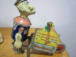 VINTAGE MARX POPEYE EXPRESS WIND UP TIN TOY FIXED PARROT and Pop UP PARROT 2