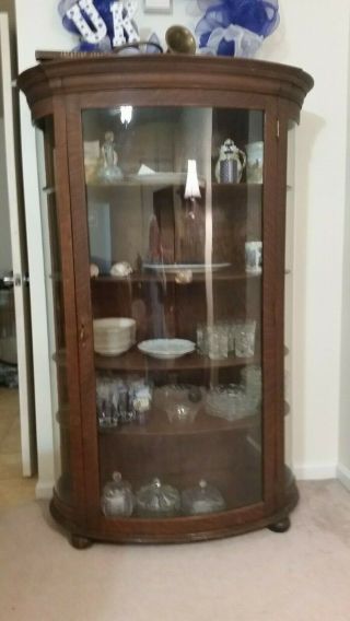 Antique Oak China Curio Cabinet - serpentine glass on three sides - 5 wood shelv 5