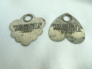 2 Antique H.  V.  Bretney Co Leather Tannery Springfield Ohio Tin Tags