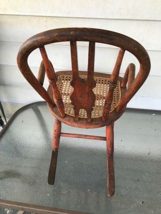 vintage antique childs wooden rocking chair with wicker bottom 3