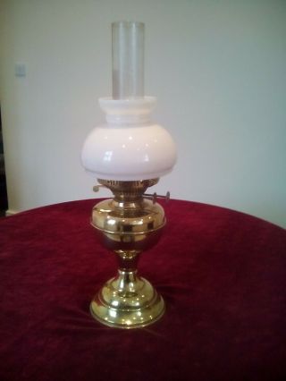 A Vintage Brass Oil Lamp With White Shade Duplex Twin Burner Order