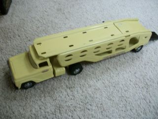 1959 tonka car carrier rare to find with ramp very good toy.  first year 6