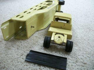 1959 tonka car carrier rare to find with ramp very good toy.  first year 7