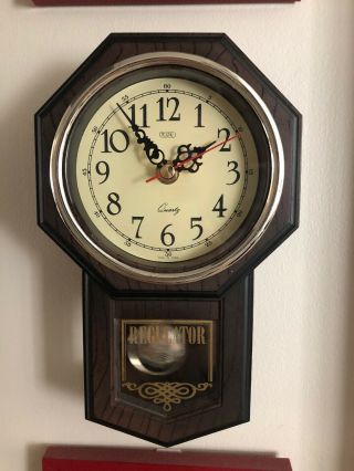 Vintage Tozai Regulator pendulum wall clock.  Rare mini clock.  great 3