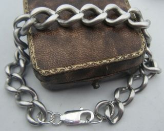 An Antique Silver Chain Charm Bracelet With A Contemporary Lobster Clasp