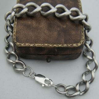 An Antique Silver Chain Charm Bracelet With A Contemporary Lobster Clasp 4