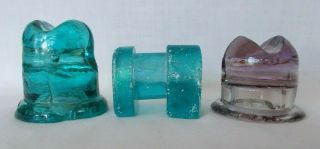 Three Old Glass Insulators