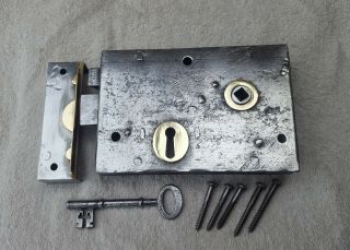 Victorian Iron And Brass Rim Lock With Keep,  Key,  And Fixing Screws