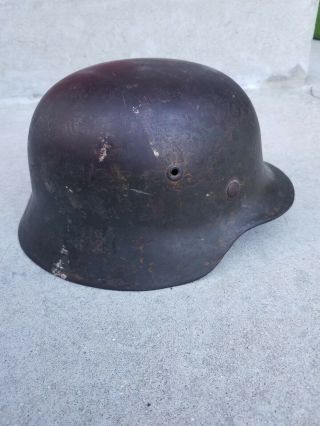 Wwii German Military Helmet Complete With Liner And Chinstrap.