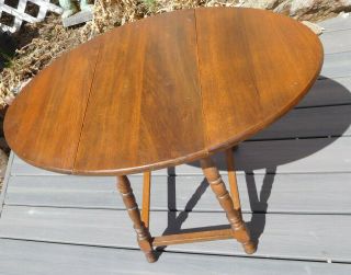Vintage Diminutive Oval Drop Leaf Table 4