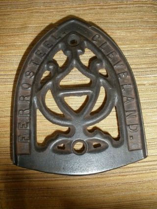 Anitque FERROSTEEL.  CLEVELAND.  3 - Legged Cast Iron Sad Iron Trivet 2