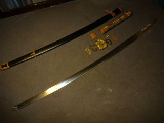 Japanese WWll Army officer ' s sword in mountings,  