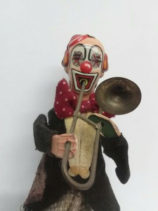 Vintage Clown In A Bowtie Playing A Trombone Wind Up Tin Toy Made In Japan