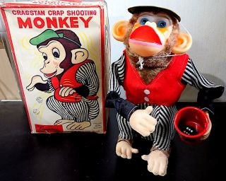 Vintage Tinplate Battery Operated Crapshooting Monkey Toy,  Alps.  Japan.  1960 