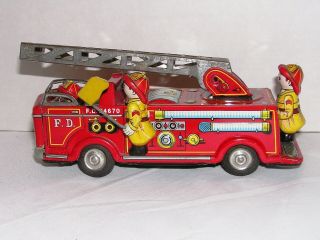 Vintage T.  N Nomura Japan Tin Friction Fire Engine Toy Truck 24670 1950s