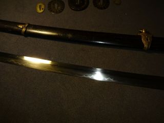 Japanese WWll Naval officer ' s sword in mountings,  