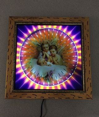 Kitsch Light Up Spinning Psychedelic Baby Jesus Vintage Wall Art.