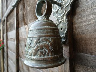 Antique Bronze wall mounted Shakespeare bell. 6