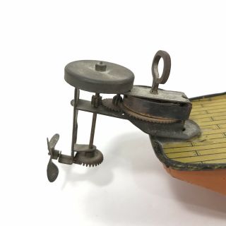 1930 ' s LINDSTROM TIN MOTOR BOAT w/ WIND UP OUTBOARD MOTOR 7