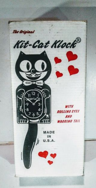 Black Electric Kit Kat Klock Wall Clock Cat