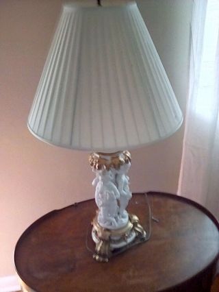 Antique French Porcelain,  Bisque Cherub table lamp/ gold gilt,  signed,  numbered 3