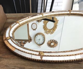 31” X 23.  5” Vintage Gold Metal Trim Belved Oval Venetian Wall Mirror