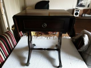 Regency Style Drop Leaf Table 2 Drawers,  Lion Claw Feet On Casters,  Ring Handles.