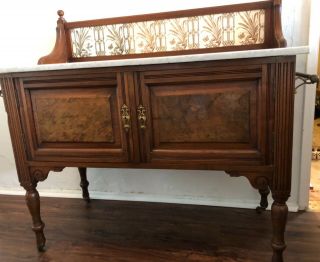 Antique Oak Buffet,  carved wood,  casters and,  Marble Top 4