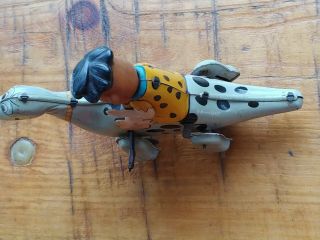 VINTAGE FLINSTONES TIN WIND UP TOY MARX FRED RIDING DINO EXTREMELY RARE.  1962 3
