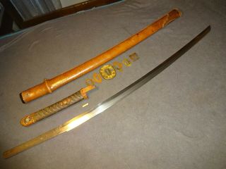 Japanese WWll Army officer ' s sword in combat mountings,  Gendaito 11