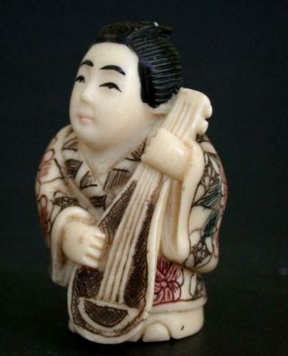 Japanese Ivory Colored Bone Netsuke - Geisha Musician Plays Samisen,  Guitar